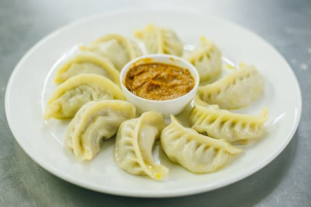 HIMALAYAN SHERPA HOMEMADE DUMPLINGS (JHOL MOMO) (Veg or Chicken)
